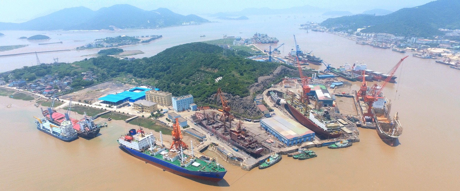 Aerial view of the Zhoushan Longsheng repair base with two drydocks and four wharfs